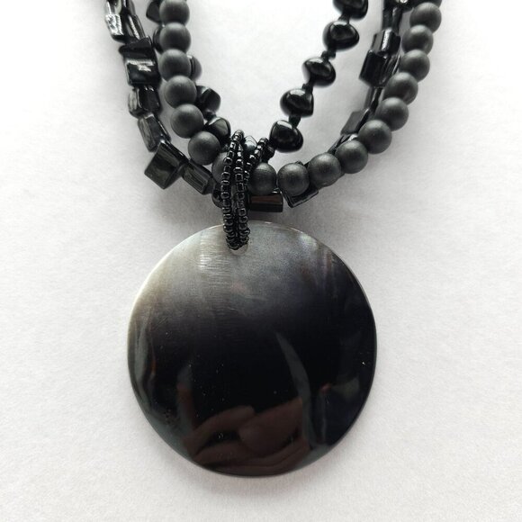 Black Multi Strand Beaded Necklace With Round Shell Pendant Adjustable Clasp - Picture 2 of 4